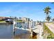 Private boat lift and dock with access to the canal at 11 Sabal Dr, Punta Gorda, FL 33950