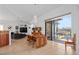 Dining room with sliding glass doors to patio and water views at 11 Sabal Dr, Punta Gorda, FL 33950