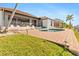 Relaxing pool area with lounge chairs and lush lawn at 11 Sabal Dr, Punta Gorda, FL 33950