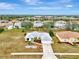 Aerial view of house and neighborhood at 13284 Buckett Cir, Port Charlotte, FL 33981