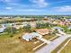 Aerial view of house and neighborhood at 13284 Buckett Cir, Port Charlotte, FL 33981