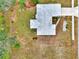 Top-down view of single-story house and surrounding land at 13284 Buckett Cir, Port Charlotte, FL 33981