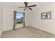 Spacious bedroom with ceiling fan and window at 13284 Buckett Cir, Port Charlotte, FL 33981