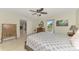 Bedroom with double bed and access to the backyard at 13284 Buckett Cir, Port Charlotte, FL 33981