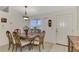 Dining room with wooden table, chairs and a decorative centerpiece at 13284 Buckett Cir, Port Charlotte, FL 33981