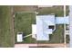 Overhead view of single-story house, yard, and detached shed at 13323 Copper Ave, Port Charlotte, FL 33981