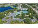 Community features a pool, tennis courts, and lake at 1433 Red Oak Ln, Port Charlotte, FL 33948