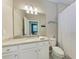 Clean bathroom with granite countertop and shower at 15169 Spanish Point Dr, Port Charlotte, FL 33981