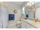 Bathroom with granite countertop and shower at 15169 Spanish Point Dr, Port Charlotte, FL 33981