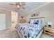 Bright bedroom with a king-size bed and en-suite bathroom at 15169 Spanish Point Dr, Port Charlotte, FL 33981