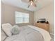 Spacious bedroom with a dresser and TV at 15169 Spanish Point Dr, Port Charlotte, FL 33981