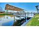 Covered boat lift on the canal at 15706 Viscount Cir, Port Charlotte, FL 33981