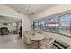 Casual dining area with view into living room and pool at 15706 Viscount Cir, Port Charlotte, FL 33981