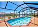 Relaxing screened pool area at 15706 Viscount Cir, Port Charlotte, FL 33981