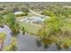 High-angle view of the property, highlighting its waterfront location at 1638 Viscaya Dr, Port Charlotte, FL 33952