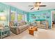 Living room with coastal decor and comfy seating at 1638 Viscaya Dr, Port Charlotte, FL 33952