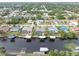 Aerial view of waterfront community with homes and canals at 18305 Wolbrette Cir, Port Charlotte, FL 33948