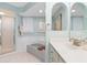 Bathroom with shower, bathtub, and double vanity at 18305 Wolbrette Cir, Port Charlotte, FL 33948