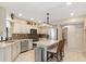 Modern kitchen with stainless steel appliances and an island at 18305 Wolbrette Cir, Port Charlotte, FL 33948