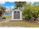 Convenient storage shed nestled in the backyard at 18305 Wolbrette Cir, Port Charlotte, FL 33948