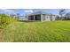 Large backyard with screened-in porch at 1966 Trout Cir, Englewood, FL 34224