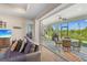 Living room with sliding doors that lead to a relaxing patio area at 1966 Trout Cir, Englewood, FL 34224