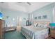 Spacious main bedroom with a king-size bed and en-suite bathroom at 1966 Trout Cir, Englewood, FL 34224