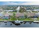 Aerial view of waterfront home with pool and boat dock at 2064 El Cerito Ct, Punta Gorda, FL 33950