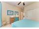 Bedroom with dresser, and coastal-themed artwork at 2064 El Cerito Ct, Punta Gorda, FL 33950