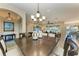 Elegant dining area with a view into the living room and kitchen at 2064 El Cerito Ct, Punta Gorda, FL 33950