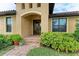 Elegant entryway with double doors and brick walkway at 2064 El Cerito Ct, Punta Gorda, FL 33950