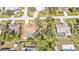 Aerial view highlighting the property's lot lines with lush landscaping and a private pool at 21217 Knollwood Ave, Port Charlotte, FL 33952