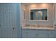 Bathroom with vanity, single sink and large medicine cabinet at 21217 Knollwood Ave, Port Charlotte, FL 33952