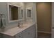 Bathroom with vanity, large mirror, and updated fixtures at 21217 Knollwood Ave, Port Charlotte, FL 33952