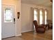 Bright and spacious entryway with hardwood floors and stained glass door at 21217 Knollwood Ave, Port Charlotte, FL 33952