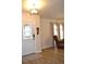 Bright entryway with hardwood floors and stained glass door at 21217 Knollwood Ave, Port Charlotte, FL 33952