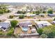 Aerial view showing home's location and backyard pool at 21354 Austin Ave, Port Charlotte, FL 33952