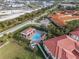 Community pool and spa are shown in this aerial view at 240 W End Dr # 212, Punta Gorda, FL 33950