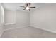 Spacious bedroom with neutral walls, plush carpet, and a window seat at 240 W End Dr # 212, Punta Gorda, FL 33950