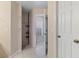 Bathroom with shower and additional room access at 2411 Altoona Ave, North Port, FL 34286