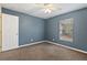 Bright bedroom featuring a ceiling fan and window at 2411 Altoona Ave, North Port, FL 34286