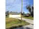 Single car detached garage with long driveway at 2430 Dixie Ave, Punta Gorda, FL 33950