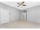 Spacious bedroom with tile floors and ceiling fan at 24434 Rio Togas Rd, Punta Gorda, FL 33955