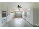 Garage with built-in cabinets and ceiling fan at 24434 Rio Togas Rd, Punta Gorda, FL 33955