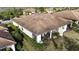 Aerial view of home showcasing roof, lanai, and landscaping at 2476 Daisy Dr, North Port, FL 34289