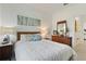 Serene bedroom featuring a comfortable bed and stylish decor at 25339 Alicante Dr, Punta Gorda, FL 33955