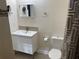 Modern bathroom with white vanity and updated fixtures at 27300 San Carlos Dr, Punta Gorda, FL 33983