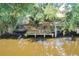 Private dock with steps providing easy water access at 27300 San Carlos Dr, Punta Gorda, FL 33983