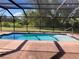 Inviting screened pool with ample deck space at 27300 San Carlos Dr, Punta Gorda, FL 33983