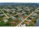 Aerial view of residential neighborhood with houses and waterways at 2798 Rock Creek Dr, Port Charlotte, FL 33948